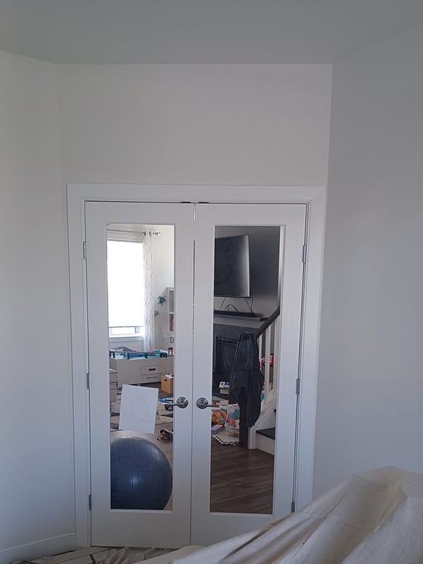 White walls and glass French doors before color update